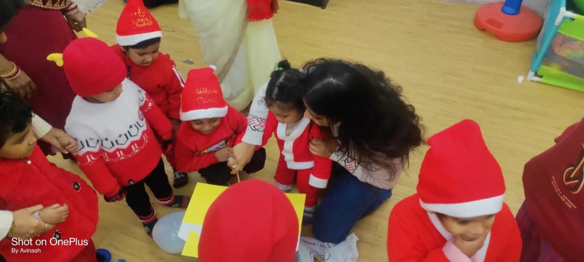 Children and staff at Shiv Aditya Foundation special school in New Delhi