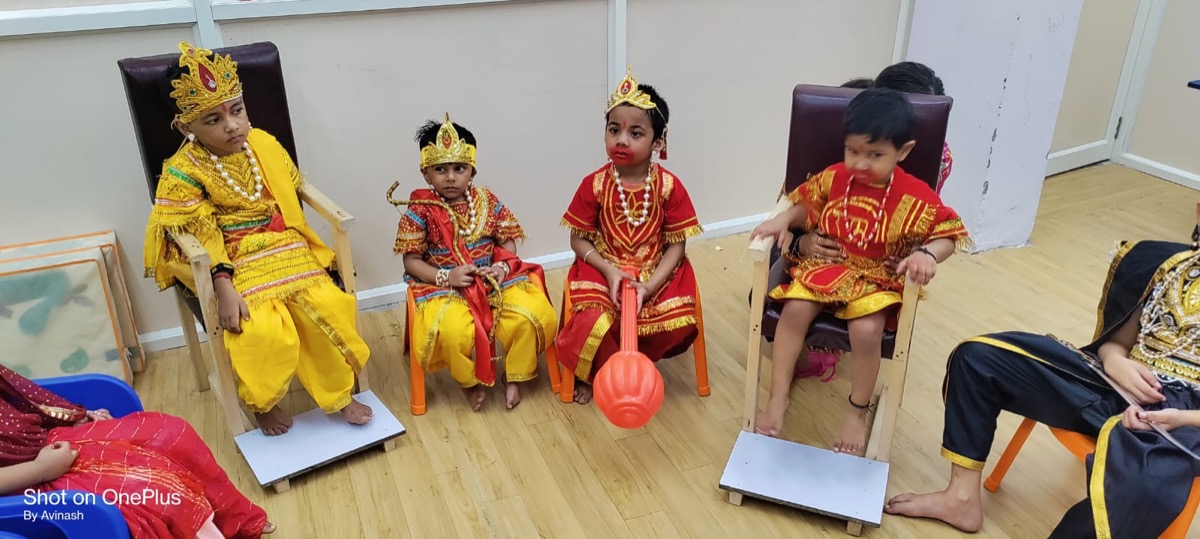 Children in festive costumes at school
