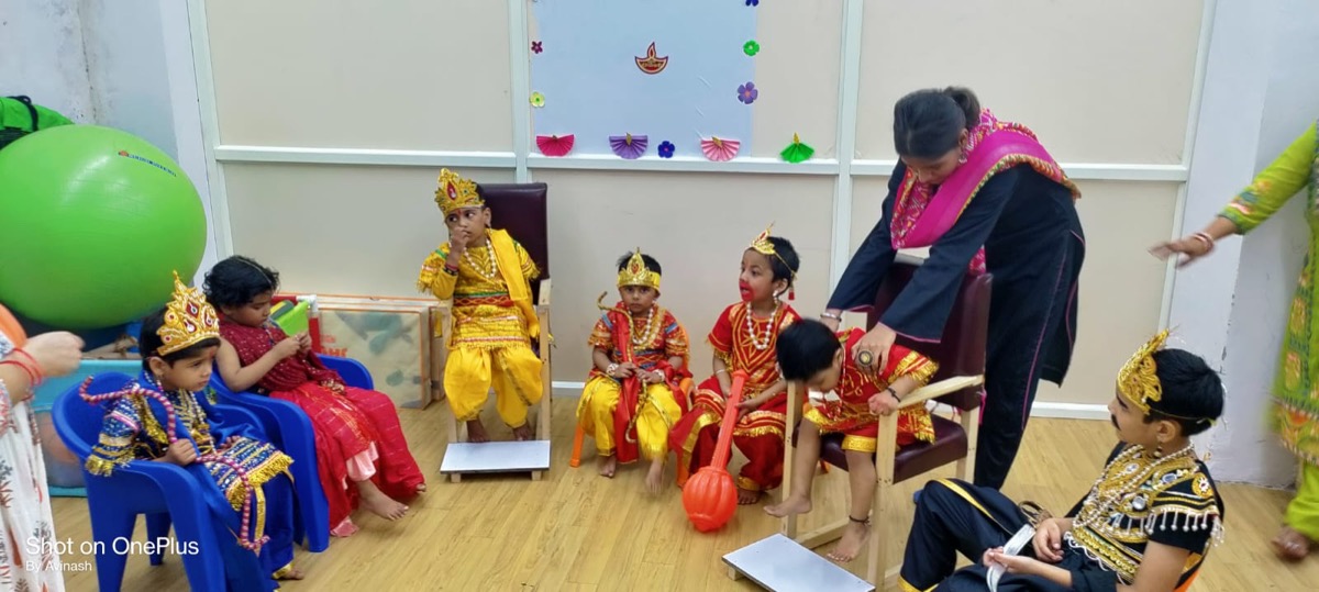 Teacher helping a child get ready for a school celebration